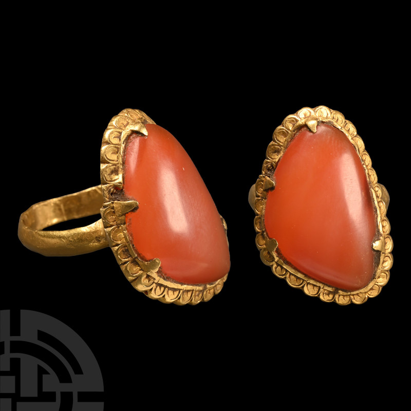 Gold Ring with Carnelian Cabochon
Circa 16th-17th century A.D. The hoop carinat...