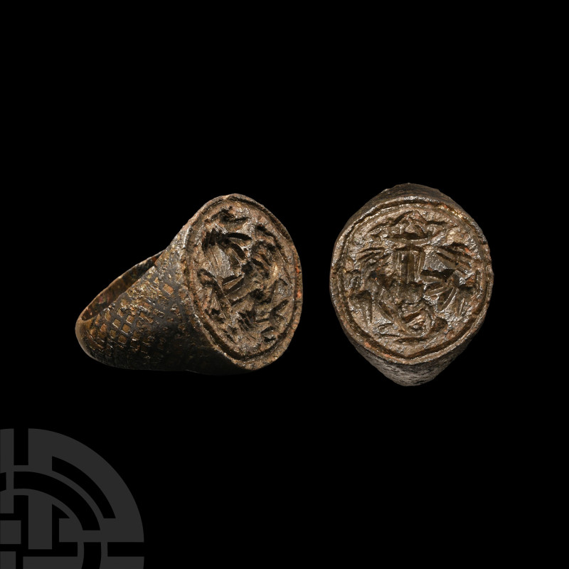 Tudor Period Bronze Armorial Signet Ring
16th-17th century A.D. Hoop expanding ...