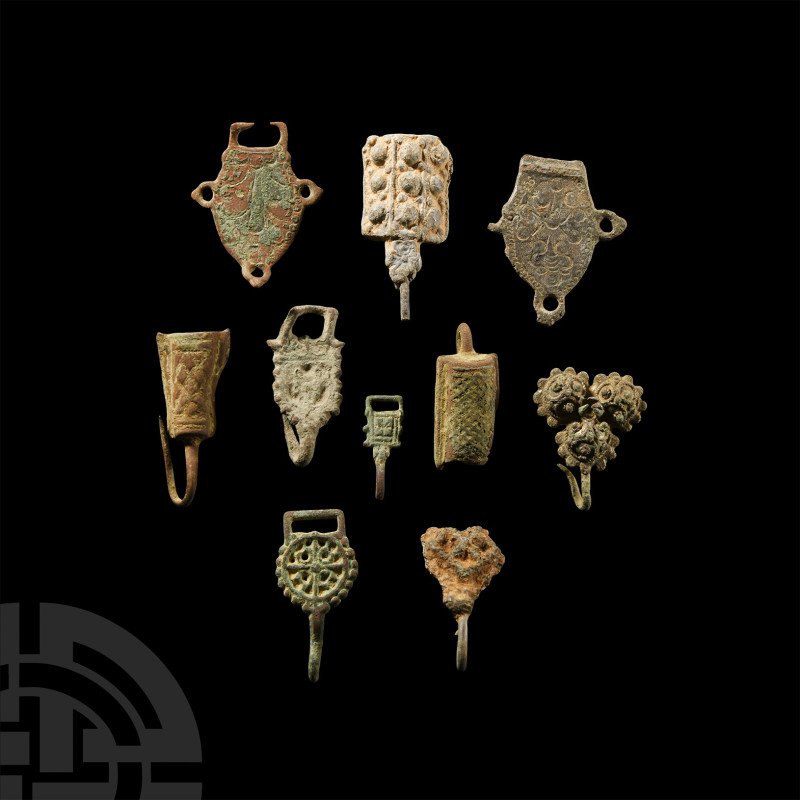 Post Medieval Bronze Clothes Fastener Group
18th-19th century A.D. Three accomp...