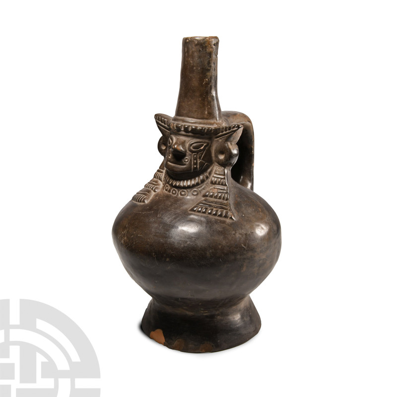 Pre-Columbian Lambayeque Blackware CeramicMasked Lord Vessel
Circa 8th-12th cen...