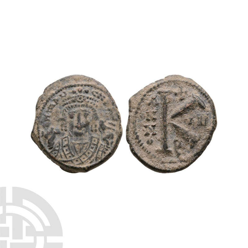 Byzantine Coins - Maurice Tiberius - Half Follis
582-602 A.D. Constantinople mi...