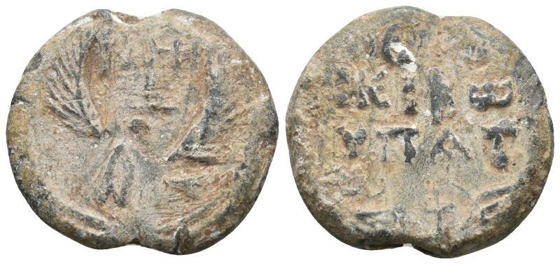 BYZANTINE LEAD SEALS.
22.04 Gr. 29.7 mm.