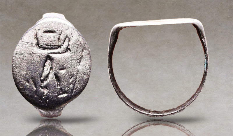 Greek Silver Ring with Seated Goddess, 5th-3rd century B.C. A silver ring compos...