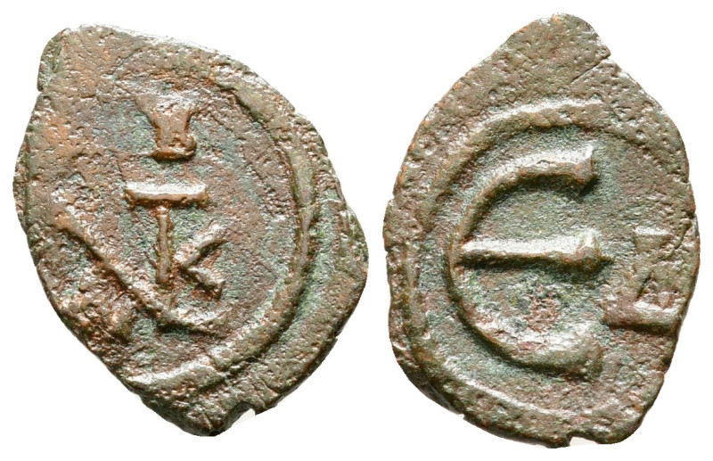 Justin II AD 565-578. Constantinople
Pentanummium Æ

16 mm, 0,73 g



ver...