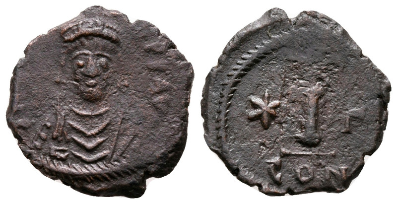 Maurice Tiberius AD 582-602. Constantinople
Decanummium Æ

17 mm, 1,62 g

...