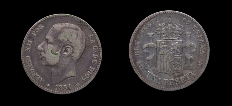 1884*84. Alfonso XII (1874-1885). 1 peseta. MSM. A&C 23. Ag. 4,89 g. Año escaso....