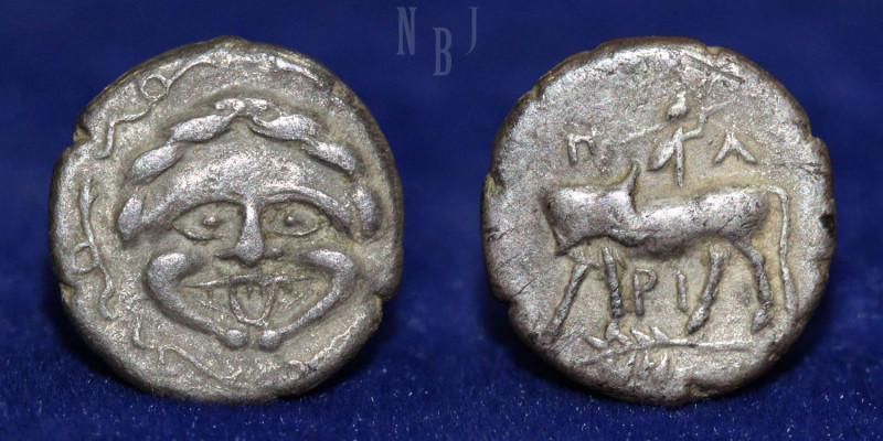 Mysia: Parion, 4th century BC. AR Hemidrachm. Gorgoneion. Bull standing left, he...