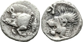 Greek
MYSIA. Kyzikos. (Circa 450-400 BC)
AR Obol (9.7mm 0.81g)
Obv: Forepart of boar left; tunny to right.
Rev: Head of roaring lion left; retrogr...