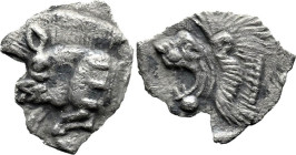 Greek
MYSIA. Kyzikos. (Circa 450-400 BC)
AR Obol (10mm 0.35g)
Obv: Forepart of boar left, with E (retrograde) on shoulder; to right, tunny upward....