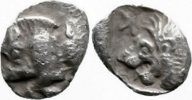 Greek
MYSIA. Kyzikos. (Circa 450-400 BC).
AR Tetartemorion (5.9mm 0.16g)
Obv: Forepart of boar left; tunny to right.
Rev: Head of roaring lion lef...