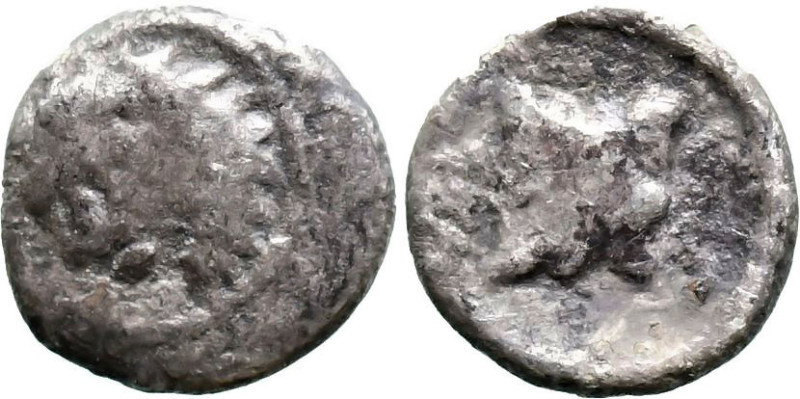 Greek
CARIA. Uncertain. (Circa 400-350 BC).
AR Hemiobol (8.3mm 0.39g)
Obv: He...