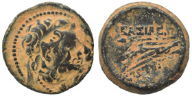 SELEUKID KINGS of SYRIA. Uncertain Ae (bronze, 7.72 g, 20 mm). Bust right. Rev. Uncertain deity standing, overstruck. Fine.