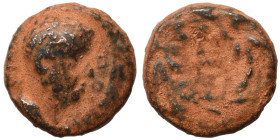 JUDAEA, Herodians. Herod IV Philip, 4 BC-34 AD. Ae (bronze, 1.64 g, 11 mm), Caesarea. [ΦΙΛΙΠ]ΠΟ[Υ] Head right. Rev. LΛΔ (date) within wreath. Meshorer...