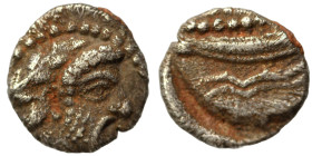 PHOENICIA. Arados. Uncertain king. Circa 400-384 BC. 1/16 Shekel (silver, 0.76 g, 9 mm). Laureate head of Ba'al-Arwad right. Rev. Galley right, above ...