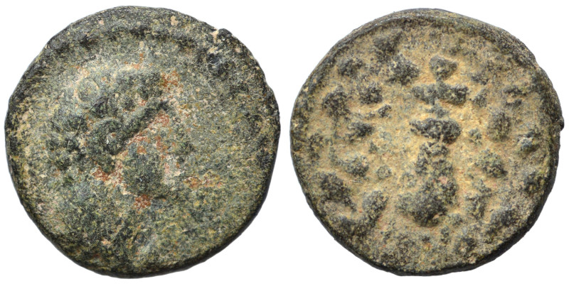 Greek. Ae (bronze, 0.87 g, 10 mm). Male head right. Rev. Club within wreath. Nea...