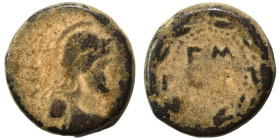DECAPOLIS. Philadelphia. Time of Titus, 79-81. 1/3 Assarion (bronze, 3.33 g, 14 mm). Helmeted and draped bust of Athena to right. Rev. ΓΜ / [LΡ] (date...