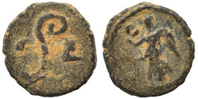 PHOENICIA. Berytus. Pseudo-autonomous issue, time of Trajan, 98-117. Ae (bronze, 0.74 g, 10 mm). Nike advancing left, holding wreath in extended right...