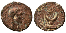 MESOPOTAMIA. Carrhae. Caracalla (or Elagabalus?), 198-217. Ae (bronze, 2.94 g, 19 mm). Laureate, draped and cuirassed bust right. Rev. Crescent with s...