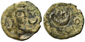 MESOPOTAMIA. Carrhae. Caracalla, 198-217. Ae (bronze, 2.26 g, 15 mm). Laureate, draped and cuirassed bust of Caracalla to right; crescent to left. Rev...