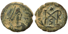 Marcian, 450-457. Nummus (bronze, 0.81 g, 10 mm), Constantinople. Diademed, draped and cuirassed bust right. Rev. Monogram in wreath, in exergue CON (...