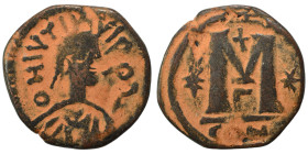 Justin I, 518-527. Follis (bronze, 11.31 g, 28 mm), Eastern imitation. Diademed, draped, and cuirassed bust right. Rev. Large M; cross above, star to ...