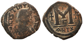 Justin I, 518-527. Follis (bronze, 14.58 g, 32 mm), Theoupolis (Antioch). D N IVSTINVS […] Diademed and draped bust of Justin I to right. Rev. Large M...
