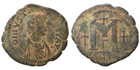 Justin I, 518-527. Follis (bronze, 16.89 g, 34 mm), Theoupolis (Antioch). D N IVSTINVS PP AVG Diademed and draped bust of Justin I to right. Rev. Larg...
