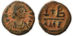 Justin I, 518-527. Nummi (bronze, 3.33 g, 16 mm), Alexandria. Blundered legend; diademed, draped and cuirassed bust to right. Rev. Cross between large...