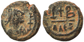Justin I (?), 518-527. Nummi (bronze, 3.08 g, 15 mm), Alexandria. Blundered legend; diademed, draped and cuirassed bust to right. Rev. Cross between l...