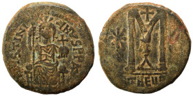 Justinian I, 527-565. Follis (bronze, 17.23 g, 32 mm), Theoupolis (Antioch). Justinian seated facing on throne, holding scepter and globus cruciger. R...