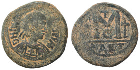 Justinian I, 527-565. Follis (bronze, 12.41 g, 29 mm), Carthage. D N IVSTINIANVS P P AVG Diademed, draped, and cuirassed bust of Justinian I to right ...