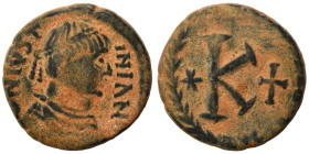 Justinian I, 527-565. Half Follis (bronze, 4.59 g, 20 mm), Rome. DN IVSTINIANVS P Diademed, draped, and cuirassed bust of Justinian I to right. Rev. L...