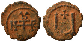 Tiberius II Constantine, 578-582. Pentanummium (bronze, 1.25 g, 14 mm), Theoupolis (Antioch). Monogram of Tiberius II Constantine. Rev. Large Ч; above...