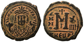 Maurice Tiberius, 582-602. Follis (bronze, 10.55 g, 27 mm), Theoupolis (Antioch). Crowned bust of Maurice Tiberius facing, wearing consular robes, hol...