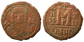 Maurice Tiberius, 582-602. Follis (bronze, 10.89 g, 28 mm), Theoupolis (Antioch). Crowned bust of Maurice Tiberius facing, wearing consular robes, hol...
