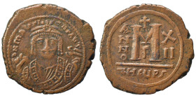 Maurice Tiberius, 582-602. Follis (bronze, 12.73 g, 32 mm), Theoupolis (Antioch). Crowned bust of Maurice Tiberius facing, wearing consular robes, hol...