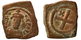 Phocas, 602-610. Decanummium (bronze, 1.88 g, 17x16 mm). Constantinople. Crowned, draped, and cuirassed facing bust. Rev. Large X; cross above. SB 645...