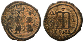 Phocas, with Leontia, 602-610. Follis (bronze, 12.88 g, 31 mm), Constantinople. Phocas, holding globus cruciger, and Leontia, holding cruciform sceptr...