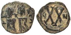 Phocas, with Leontia, 602-610. Half Follis (bronze, 4.34 g, 21 mm), uncertain northern Syrian mint, struck 615/616 under Persian rule. Phocas, holding...