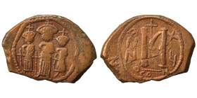 Heraclius, with Martina and Heraclius Constantine. 610-641. Follis (bronze, 7.18 g, 28 mm), uncertain mint, Arab-Byzantine imitation of Heraclius foll...