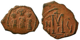 Heraclius, with Martina and Heraclius Constantine. 610-641. Follis (bronze, 3.19 g, 25 mm), uncertain mint, Arab-Byzantine imitation of Heraclius foll...