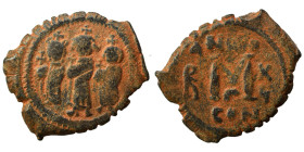 Heraclius, with Martina and Heraclius Constantine, 610-641. Follis (bronze, 5.08 g, 24 mm), Constantinople. Heraclius, in center, flanked by Martina, ...