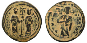 Constantine X Ducas, with Eudocia, 1059-1067. Follis (bronze, 7.85 g, 31 mm), Constantinople. +ЄΜΜΑΝΟVHΛ Christ Emmanuel standing facing on footstool,...
