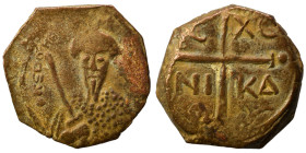 CRUSADERS. Principality of Antioch. Tancred, regent, 1101-1112. Follis (bronze, 4.13 g, 20 mm). Armored, bearded bust of Tancred facing, holding uprai...