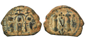 Arab-Byzantine. Circa 640-650. Imitating follis of Heraclius, 610-641. Follis (bronze, 4.92 g, 26 mm), Uncertain mint in Syria. Three standing figures...