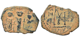 Arab-Byzantine. Circa 640-650. Imitating follis of Heraclius, 610-641. Follis (bronze, 3.54 g, 25 mm), Uncertain mint in Syria. Three standing figures...