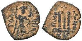 Arab-Byzantine, Umayyad Caliphate, circa 641-660. Fals (bronze, 3.88 g, 24 mm). Imitative of Constans II, standing imperial figure, holding globus cru...