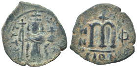 Arab-Byzantine, Umayyad Caliphate, circa 641-660. Fals (bronze, 2.53 g, 21 mm). Imitative of Constans II, standing imperial figure, holding globus cru...