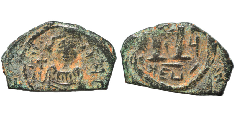 Arab-Byzantine, Umayyad Caliphate, circa 641-660. Fals (bronze, 5.66 g, 26x16 mm...