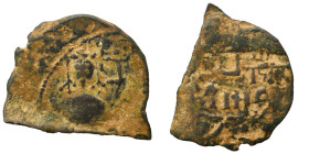 SALDUQIDS (?), circa 12th century AD. Fals (bronze, 2.19 g, 23 mm). Imperial bust facing. Rev. Illegible inscription in multiple lines. Fine.